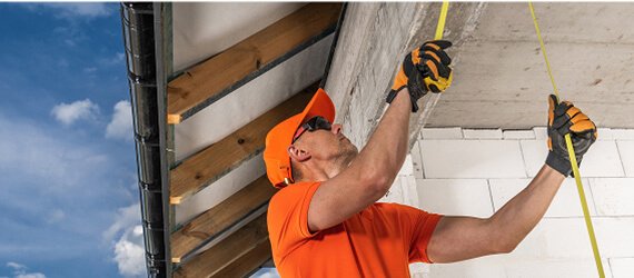 Commercial landscapers installing plants and hardscaping